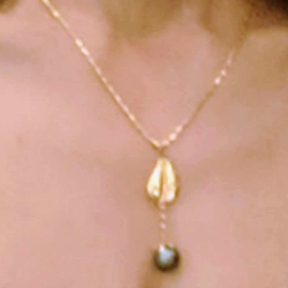 Gold chain 24 karat and Pearl one of kind.